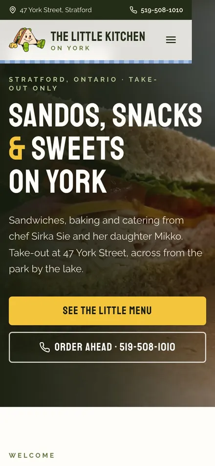 The Little Kitchen on York on a phone